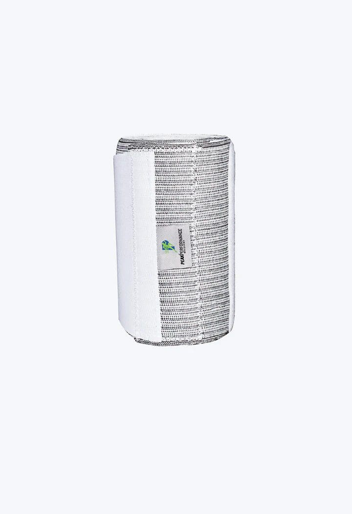 A white and gray cylinder with a green leaf on it.