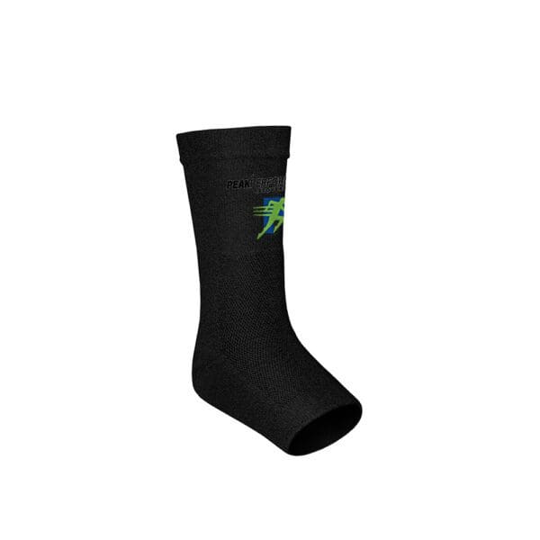 A black sock with a green star on it.