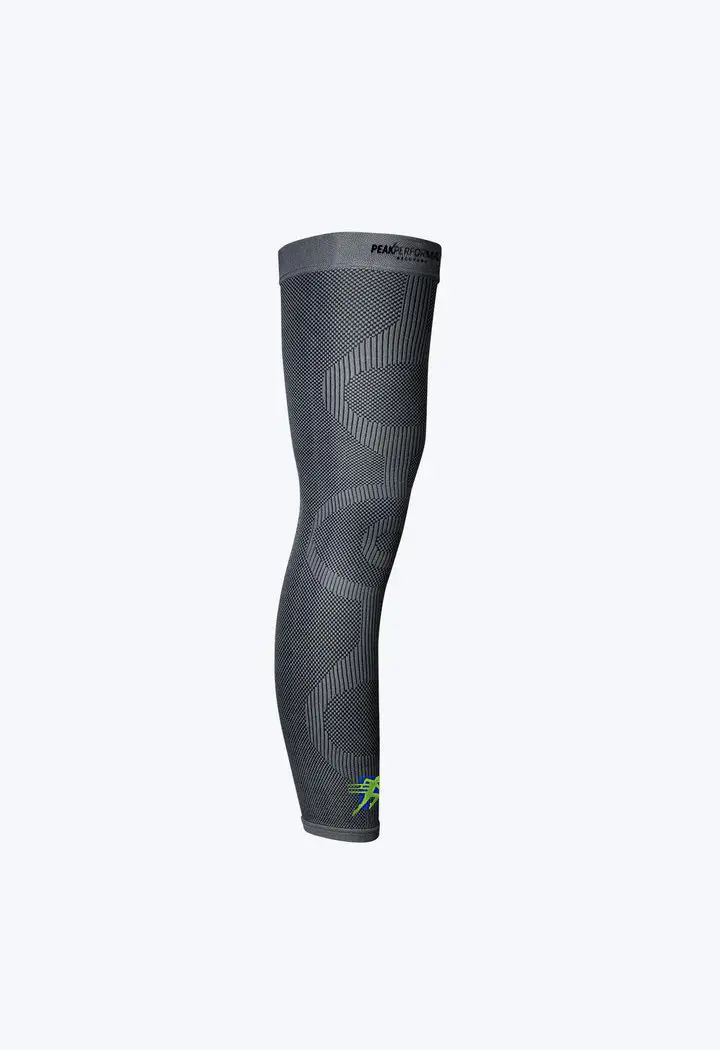 A black arm sleeve with green lettering on it.