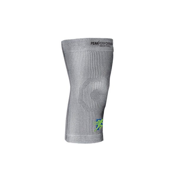 A gray knee brace with green writing on it.